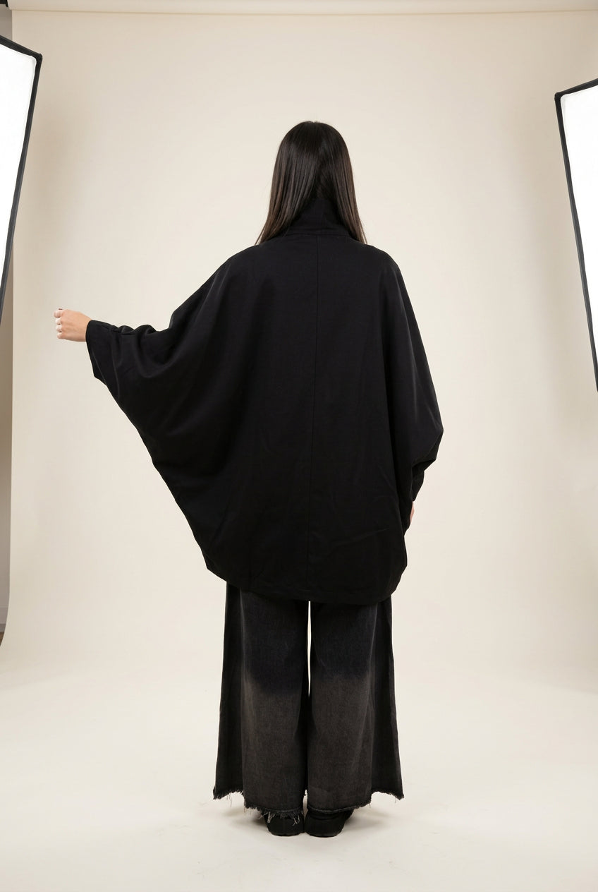Camisa de manga murciélago con bolsillos semicirculares Nefelibata
