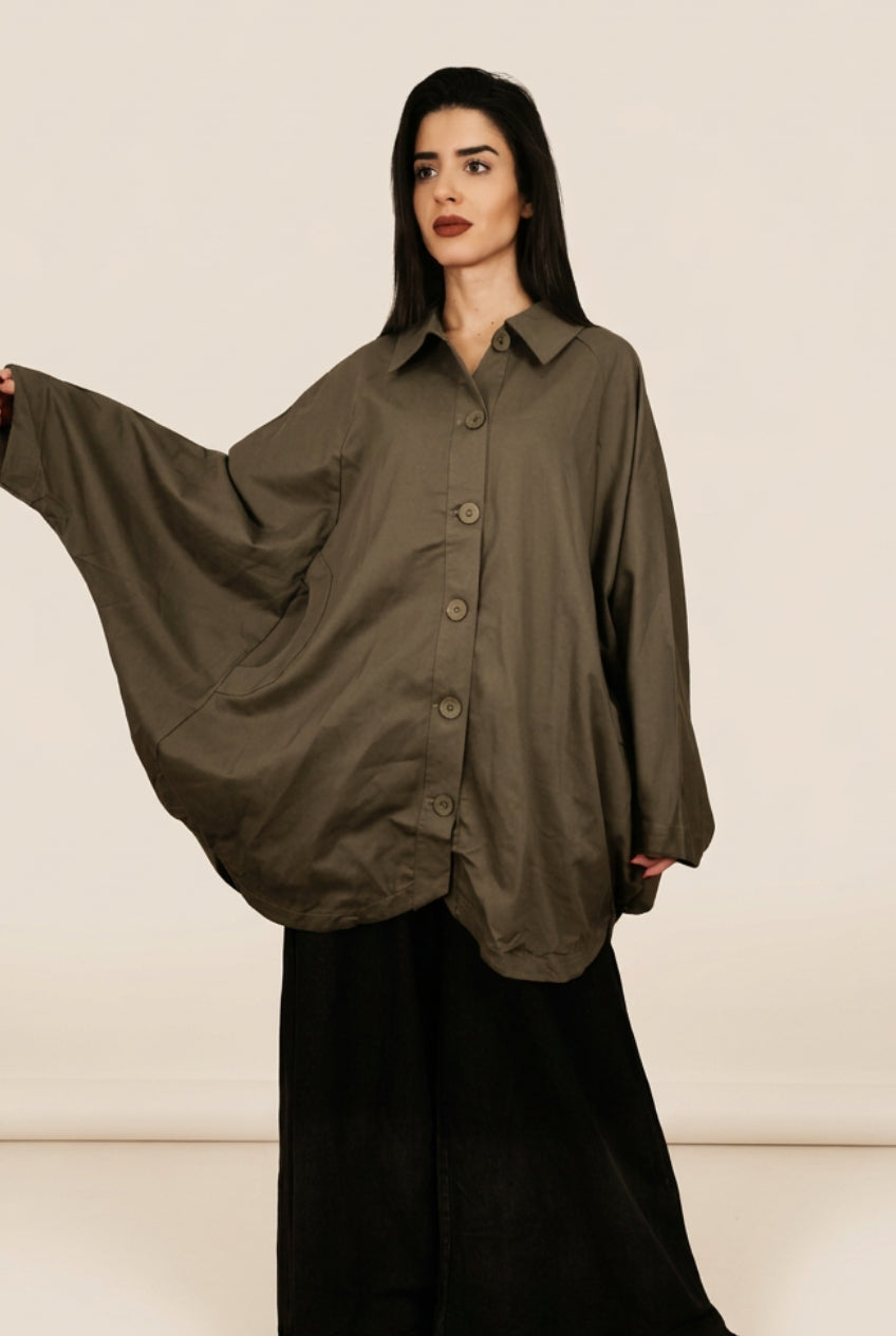 Camisa de manga murciélago con bolsillos semicirculares Nefelibata