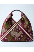Bolsa de tela estampada con asas de piel YOLYKKE