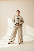 Pantalón Palazzo Jacquard Beige Franja Lateral Negra Curvy | YOLYKKE