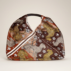 Bolsa de tela estampada con asas de piel YOLYKKE
