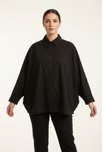 Camisa de manga murciélago con bolsillos semicirculares Nefelibata