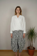 blusa de wendy trendy con goma efecto globo manga larga y cruzada delantera
