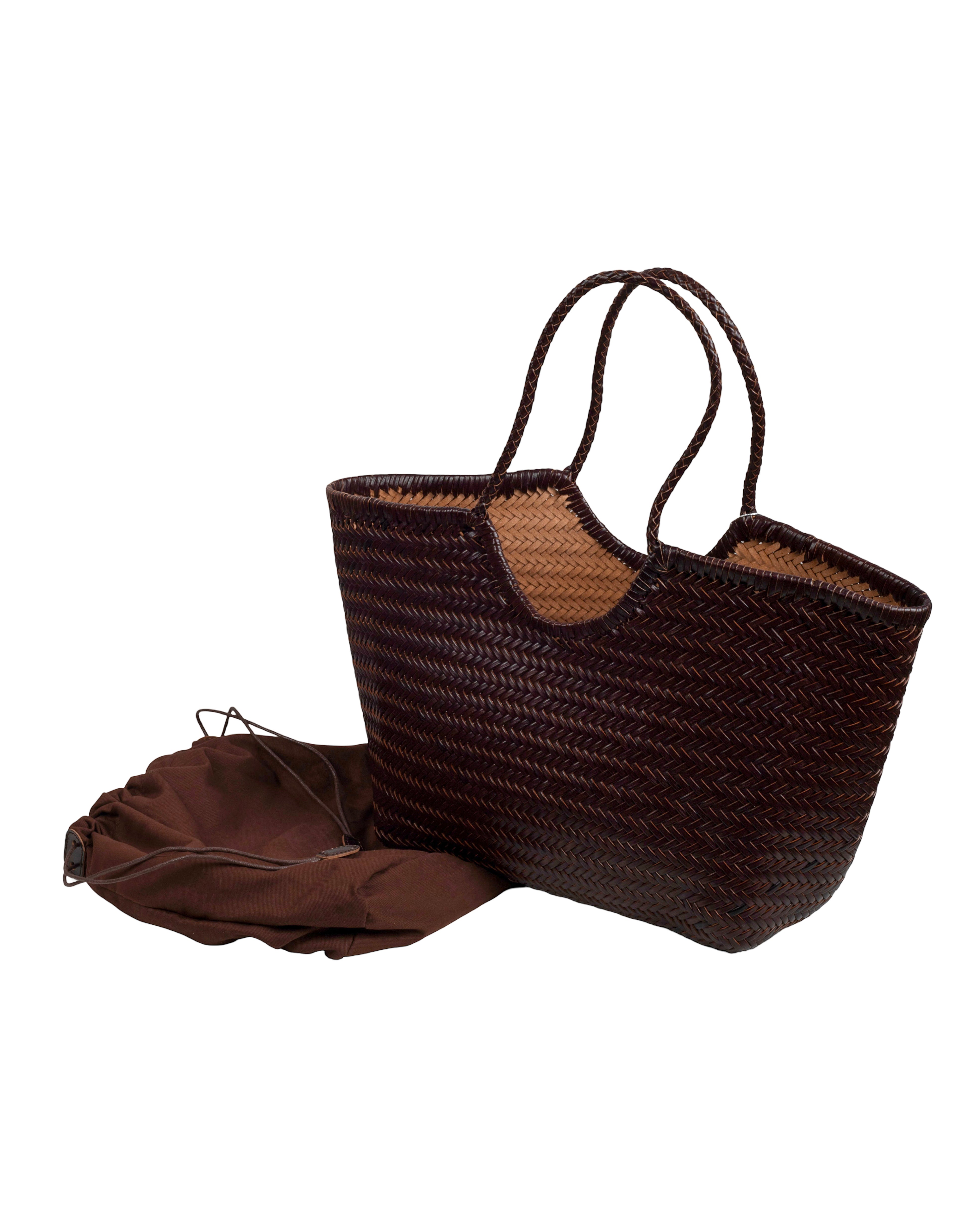 Capazo trenzado color chocolate echo en piel con dos asas largas u un bolso en tejido también chocolate Lykke