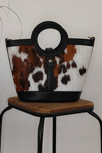 capazo-de-piel-con-pelo-de-potro