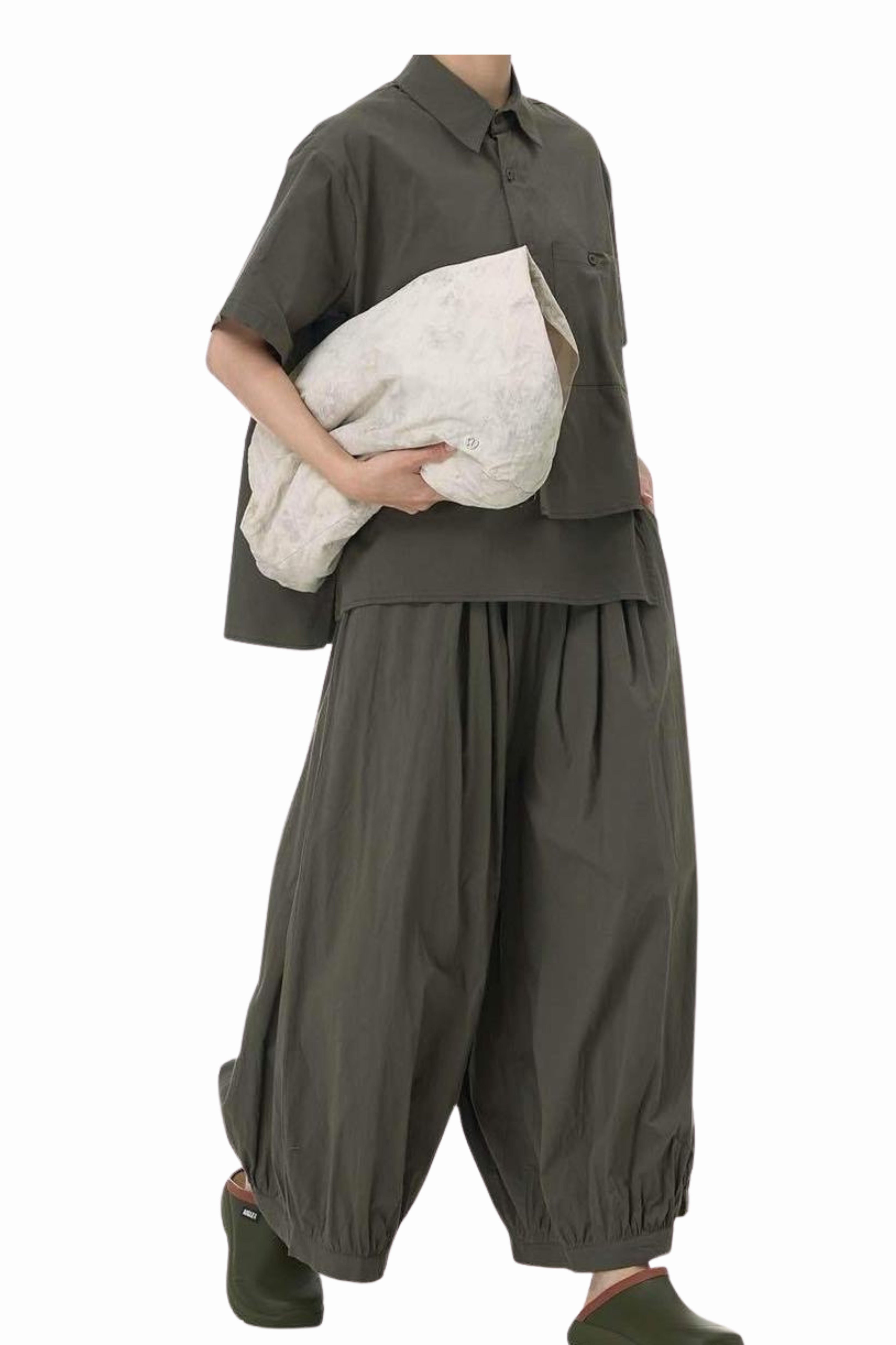 conjunto de nefelibata en verde con camisa asimetrica y pantalon globo