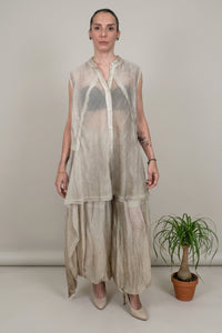 camisa yolykke en color champagne sin mangas y asimetrica
