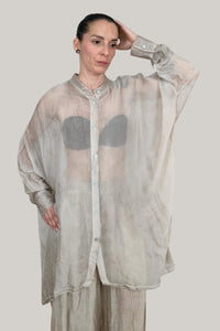 camisa yolykke en champagne con manga larga y en gasa transparente