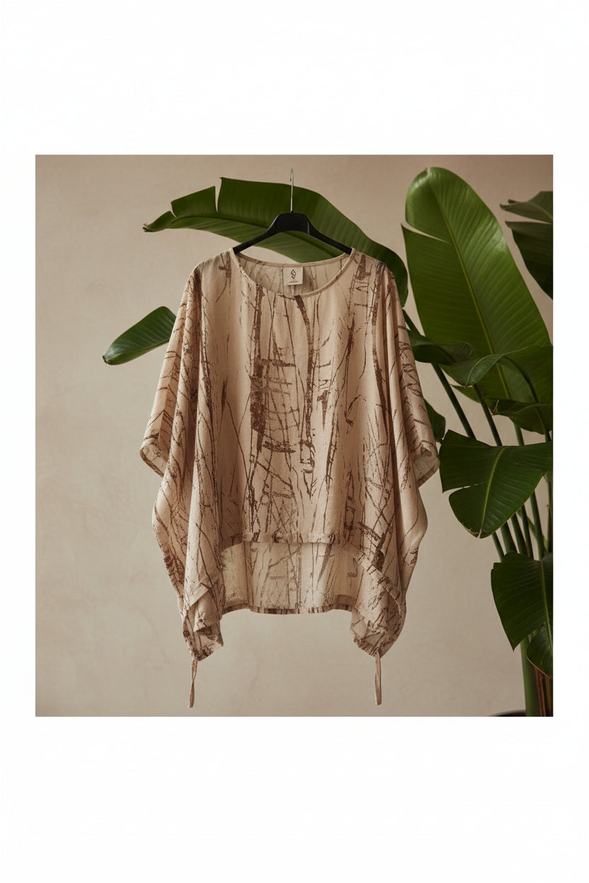 camisa yolykke ajustable en la cintura en marrón jaspeado y asimétrica