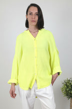 camisa fluor de jot_milano con detalle de letras en la espalda de algodón rizado