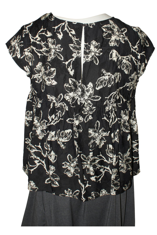 camisa estampada wendy trendy negra con flores blancas
