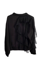 chaqueta marrón chocolate con detalle de tul en la espalda de nefelibata