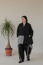 chaqueta de jot_milano con detalles de encaje tipo kimono
