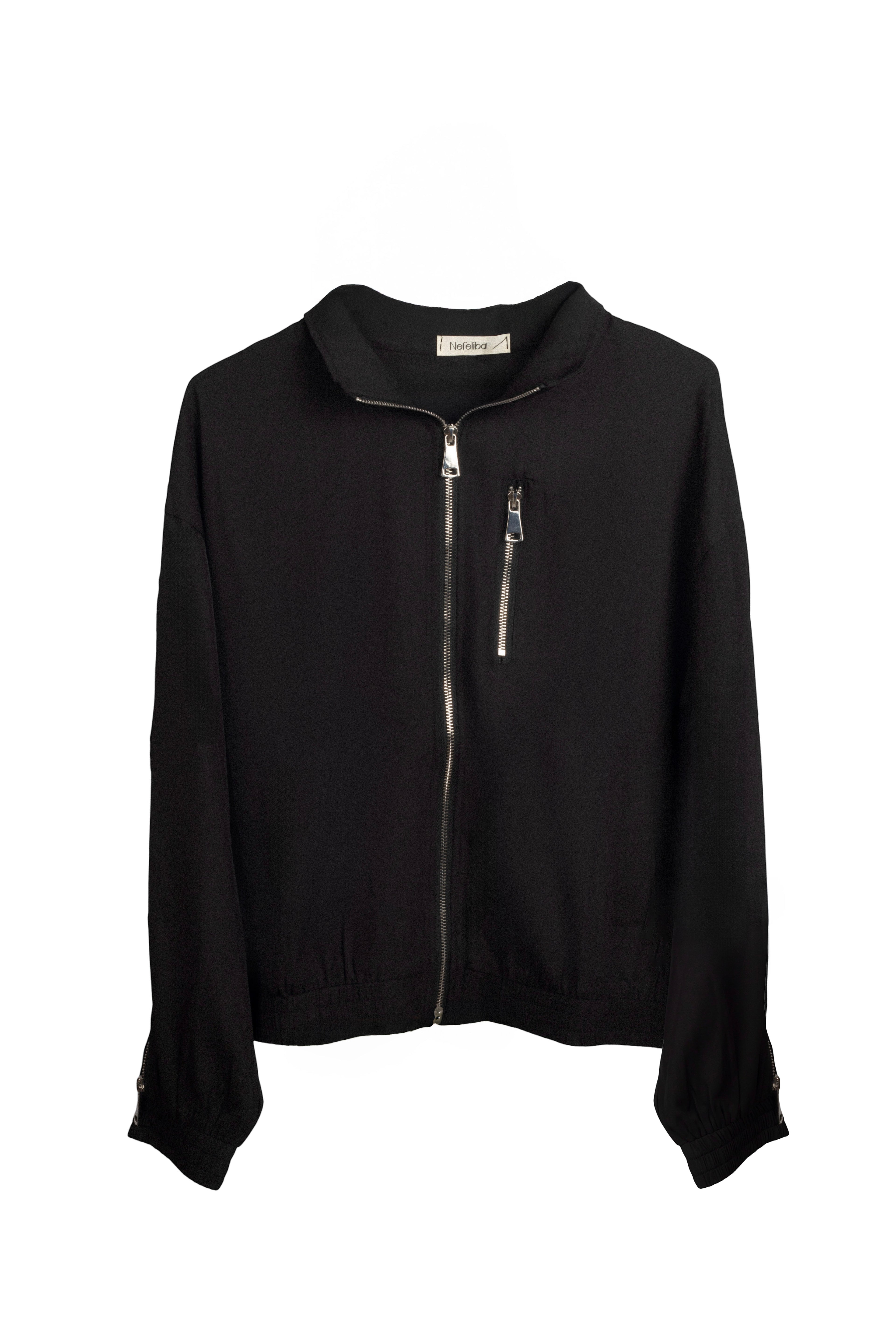 Chaqueta nefelibata marrón chocolate con cremalleras colgada LYKKE