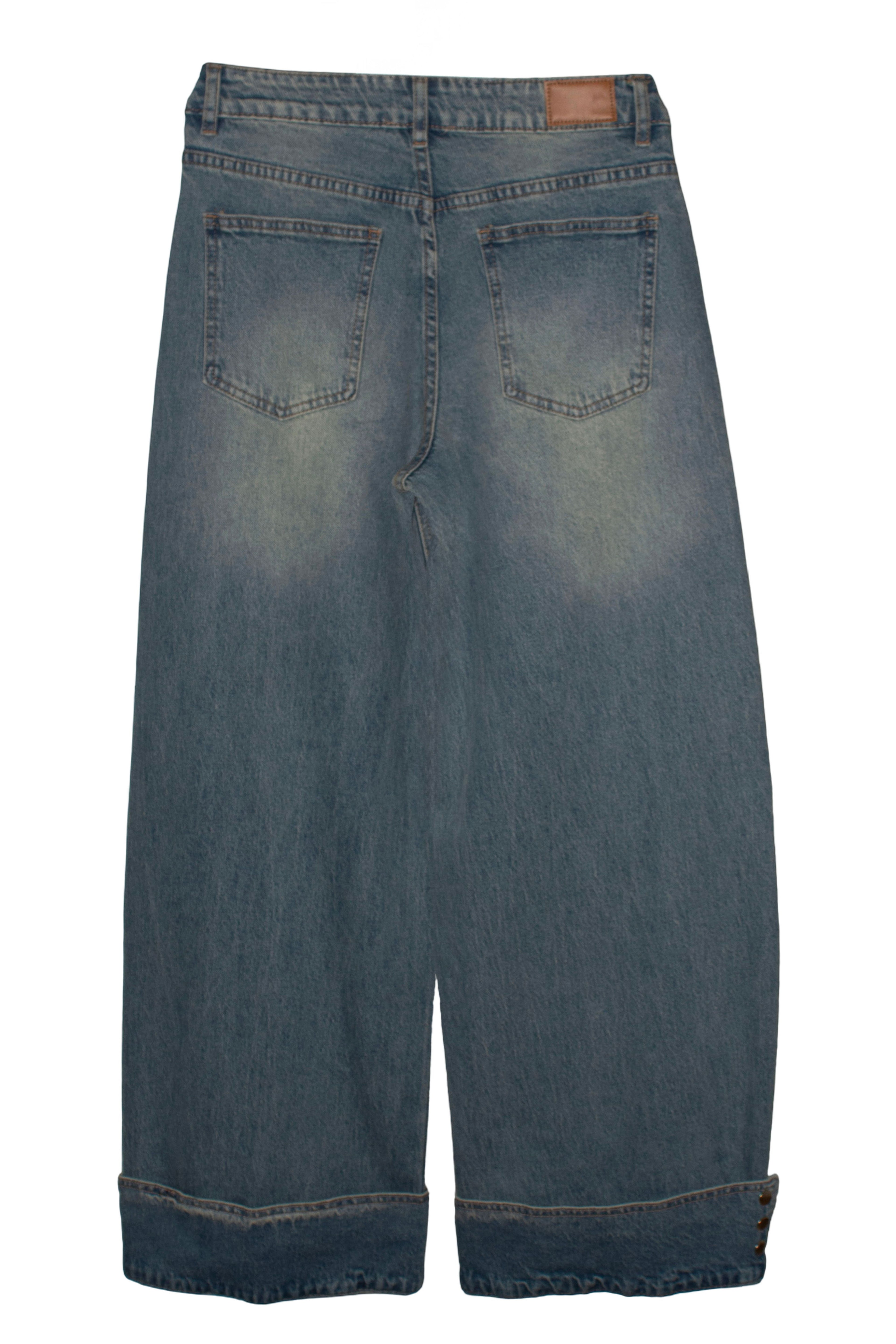 pantalón de jot_madrid con detalles de corchetes en el bajo