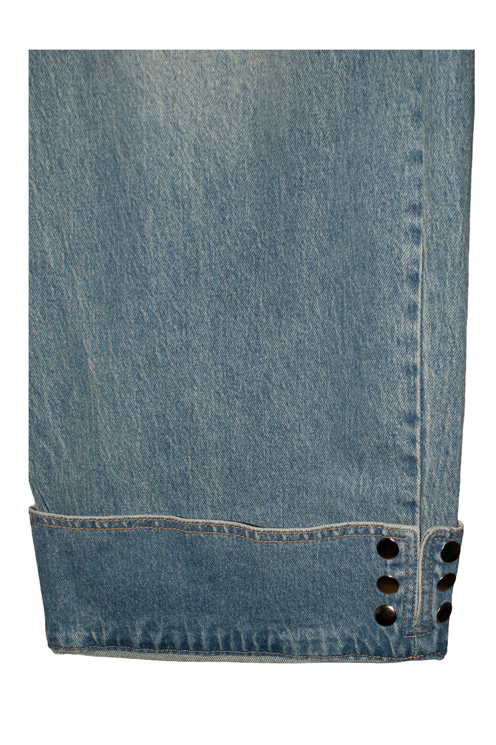 pantalón de jot_madrid vaquero con detalle de corchetes en el dobladillo