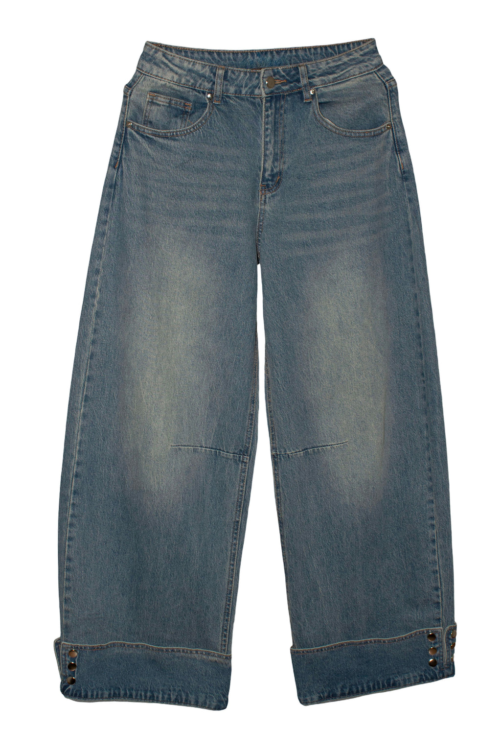 pantalon vaquero de jot_madrid con detalle de corchetes en el bajo