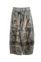 vaquero degradado con cinto colgando de jot_madrid