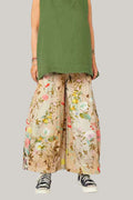 pantalon wendy trendy efecto globo en tonos tostados y blusa verde