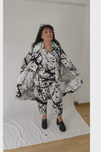 Video del conjunto de Wendy trendy manchado de pintura con gabardina pantalón y chaleco