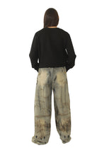 vaquero degradado con cinto colgando de jot_madrid