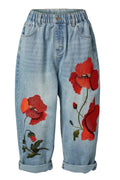 vaquero de weendy trendy con bordado de amapola roja