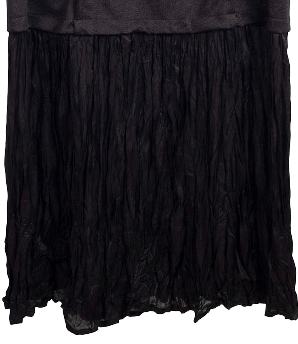 Vestido negro de wendy trendy combinado con falda plisada y sin mangas LYKKE