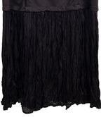 Vestido negro de wendy trendy combinado con falda plisada y sin mangas LYKKE